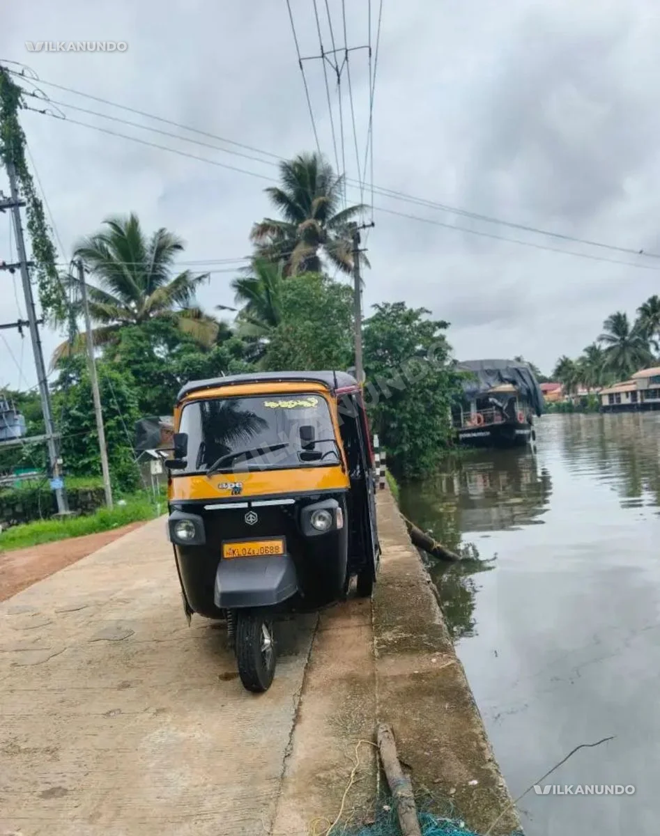 Piaggio three wheeler passenger