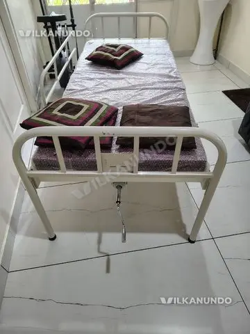 Hospital bed with mattress